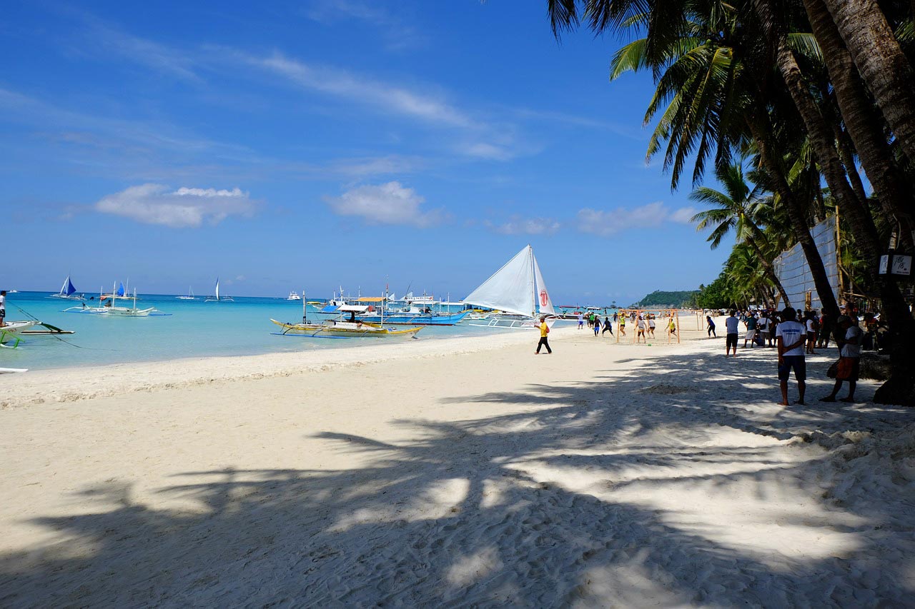 Qual a melhor praia do mundo com areia branca?