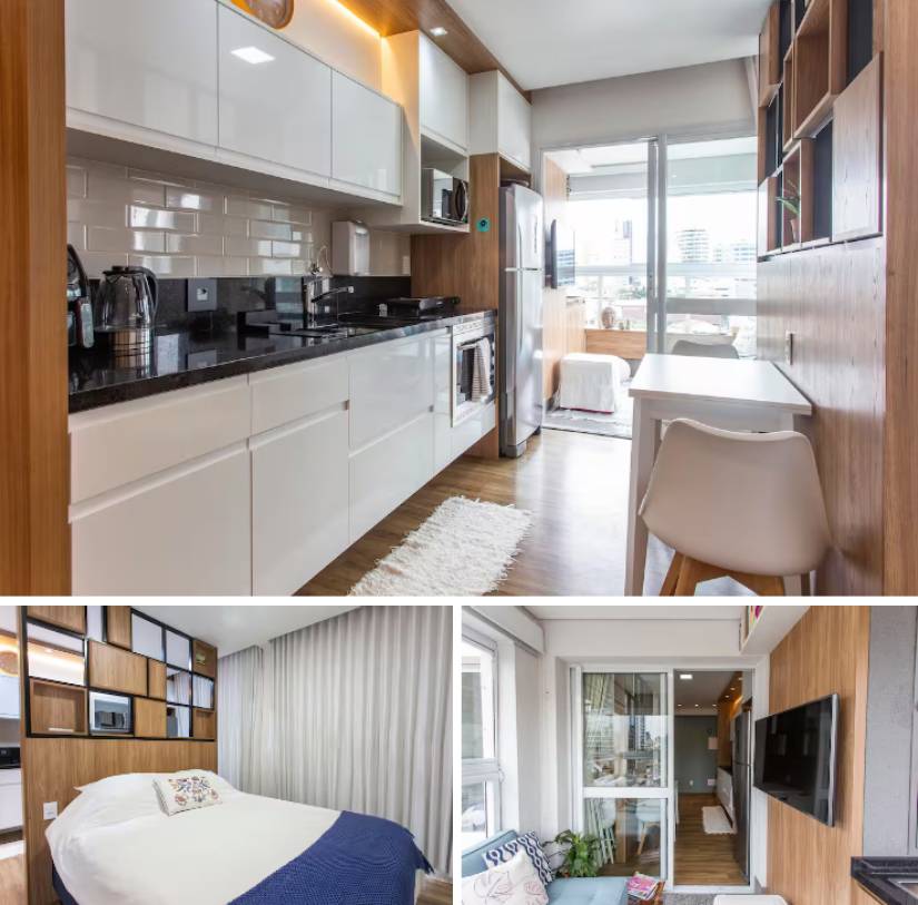 Apartamento moderno com cozinha branca, quarto aconchegante e vista para a cidade - uma experiência convidativa de hospedagem em São Paulo.